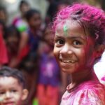 girl in shirt smiling