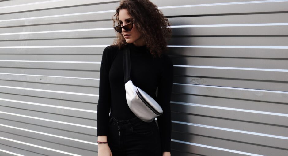 standing woman near wall
