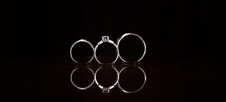 three silver-colored rings