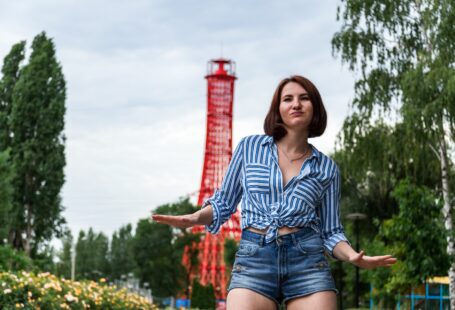 woman in blue and white striped button up shirt