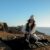 woman sitting on sand